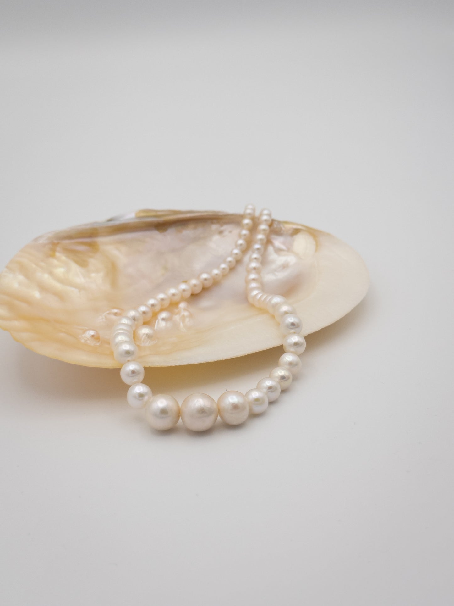 4.5-11mm Round Graduated Natural White Pearl Necklace